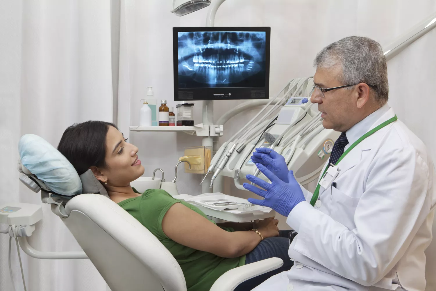 Doctor Showing X Ray To Patient