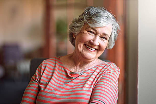 Shot Of A Senior Woman Relaxing At Home