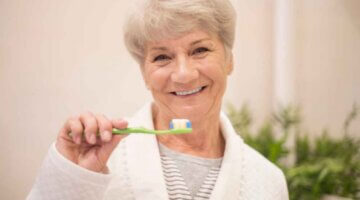How To Care For A Dental Implant Vs. A Natural Tooth